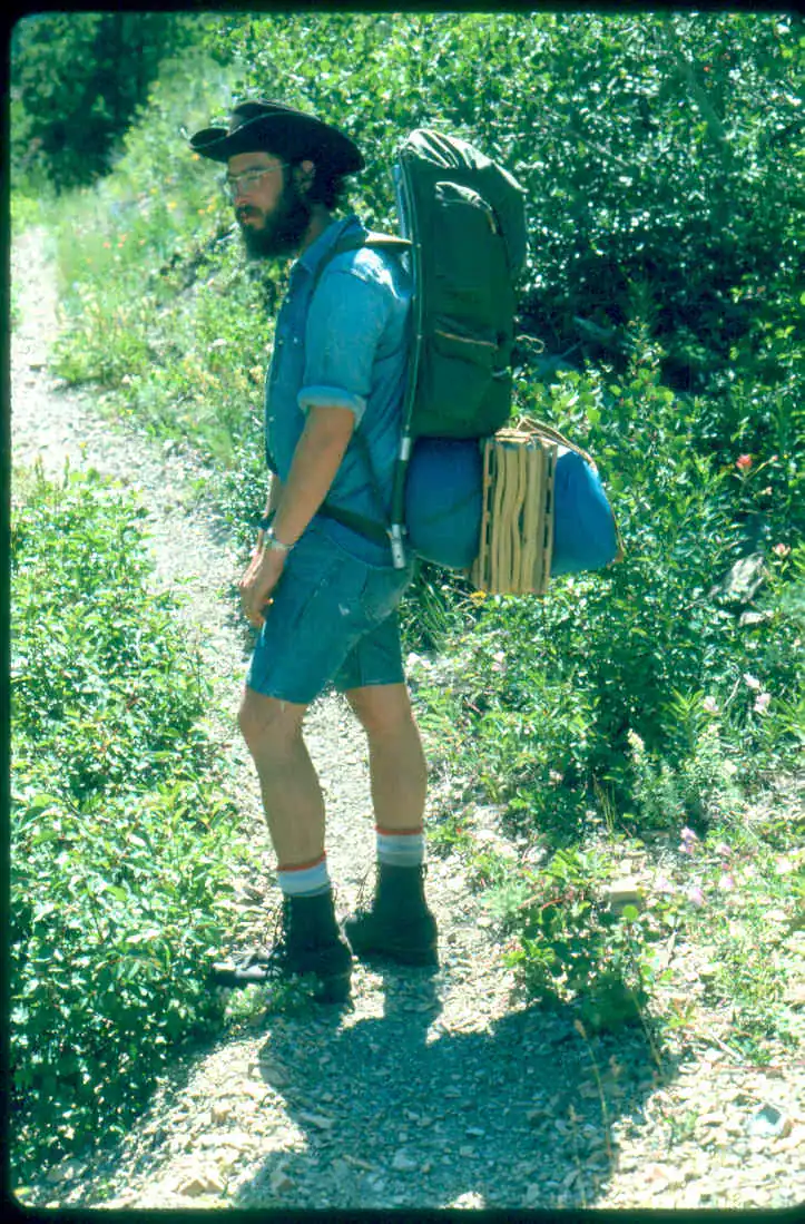 David Polster carrying field equipment in 1976